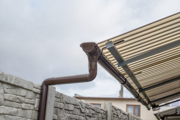 Plastic Downspout Installation in Holland
